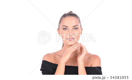 Beauty concept. A beautiful girl is fondling her Beauty concept. A beautiful girl is fondling her 54381955