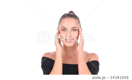 Beauty concept. A beautiful girl is fondling her 54381956
