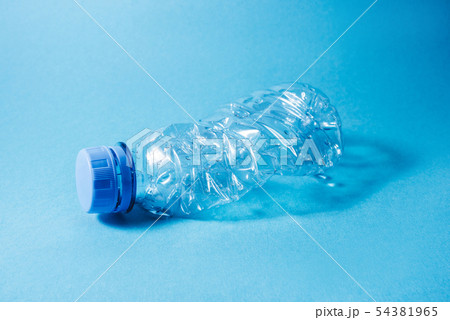 Disposable plastic bottle on blue background. 54381965