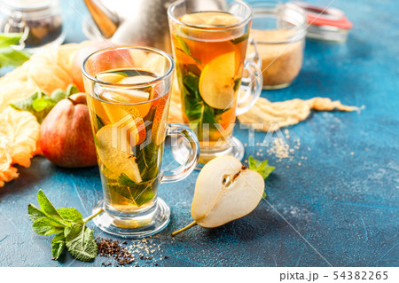 Hot fruit tea with ripe pears and mint 54382265