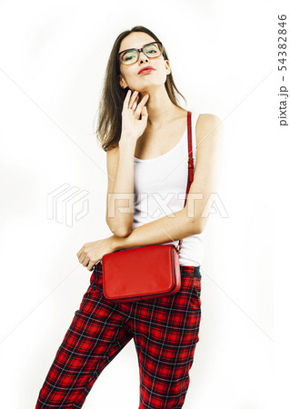 young pretty stylish brunette hipster girl in glasses posing emotional isolated on white background young pretty stylish brunette hipster girl in glasses posing emotional isolated on white background 54382846