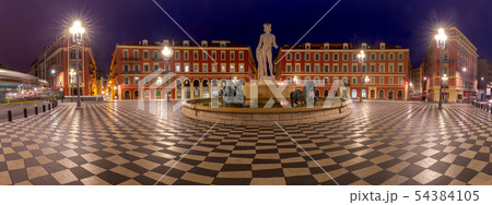 Nice. Panorama of Massena Square and the fountain in the night lighting. 54384105