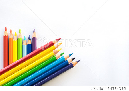Rows of Color pencils on white paper background, Rows of Color pencils on white paper background, 54384336