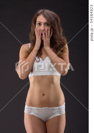 Attractive Sexy woman with beautiful body posing and wear white underwear. Attractive Sexy woman with beautiful body posing and wear white underwear. 54384923