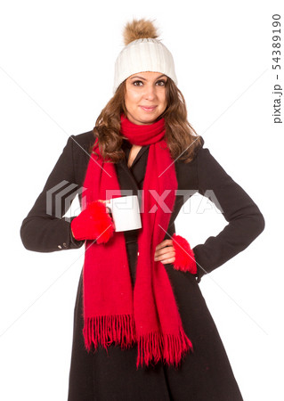 Beautiful woman holding white cup. Isolated over white. 54389190