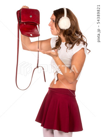Beautiful woman looking through her pocket book purse Beautiful woman looking through her pocket book purse 54389821