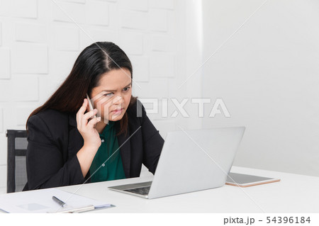 plump lady in startup office 54396184