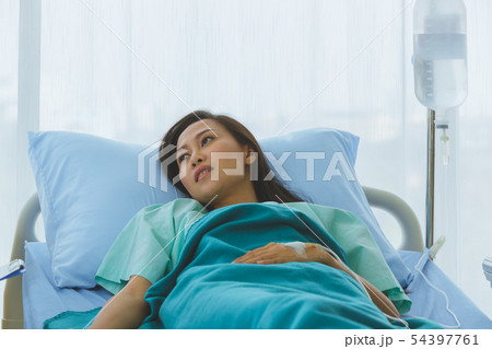 Asian doctor check the sickness of female patient. Asian doctor check the sickness of female patient. 54397761