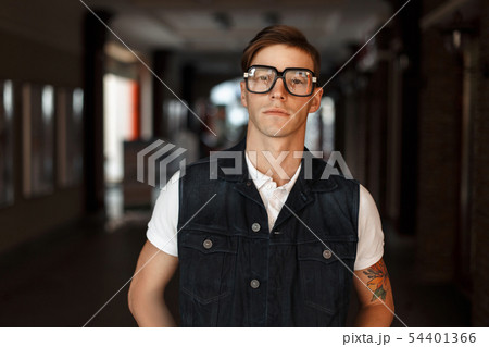 Beautiful stylish hipster man in vintage glasses 54401366