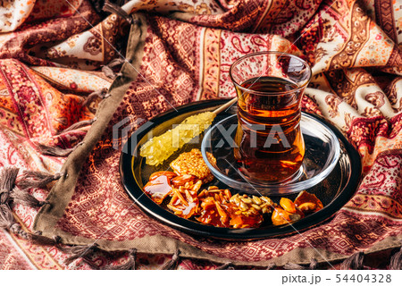 Tea in armudu with oriental delights and crystal 54404328
