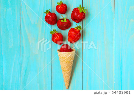 Waffle cone with fresh strawberries Waffle cone with fresh strawberries 54405901