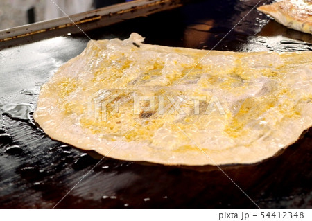 Making of dessert sweet roti 54412348