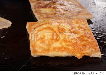 Making of dessert sweet roti 54412349