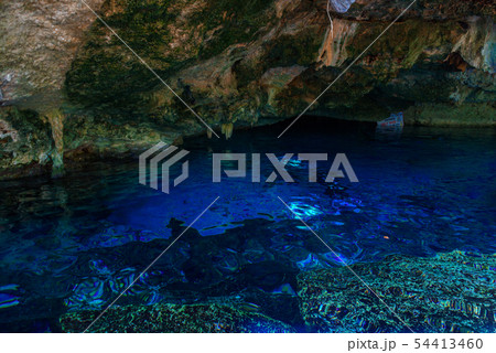 Cenote Dos Ojos with clear blue water in the cave 54413460