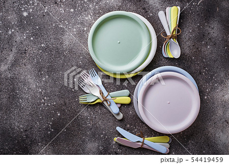 Colorful plastic dishes for summer picnic Colorful plastic dishes for summer picnic 54419459