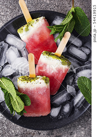 Homemade popsicles in shape of watermelon 54419915