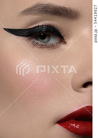 Close-up beauty of a half female face with 54419927