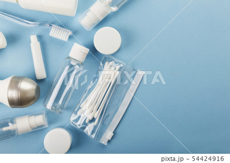 Travel small bottle set on blue background. Top Travel small bottle set on blue background. Top 54424916