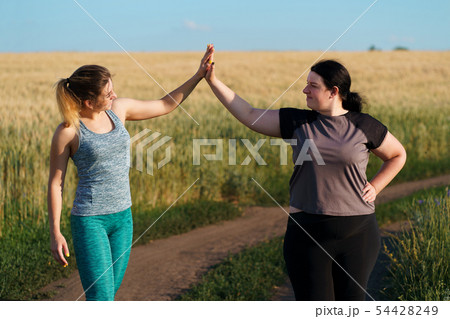 Friendship, motivation, group workout, weight loss Friendship, motivation, group workout, weight loss 54428249