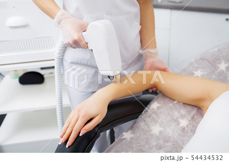 Laser hair removal in professional beauty studio Laser hair removal in professional beauty studio 54434532