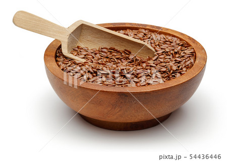 Flax seeds in wooden bowl isolated on white 54436446