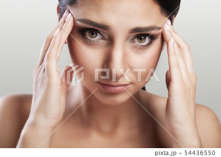 Headache And Stress. Beautiful Young Woman Feeling Strong Head Pain. Portrait Of Tired Stressed 54436550