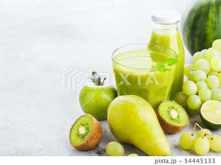 Glass and bottle of fresh smoothie with organic Glass and bottle of fresh smoothie with organic 54445133