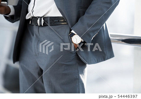 Man Hand with Wrist Watch in the Pocket of Stylish Pants 54446397