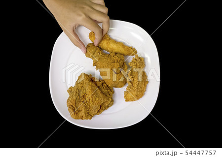 Crispy fried chicken on white plate, focus 54447757