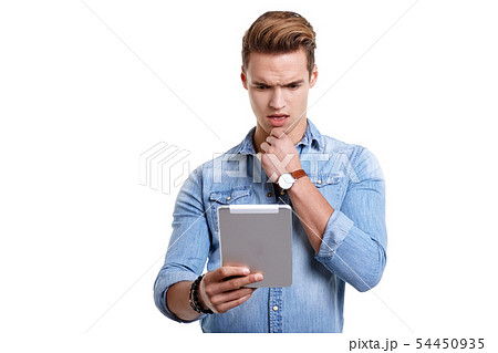 Young man using touchpad on white background 54450935