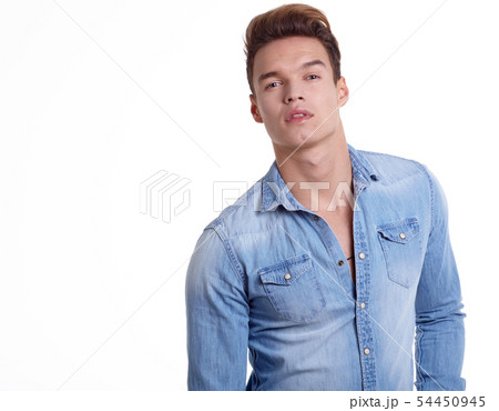 Young men model posing in the studio 54450945