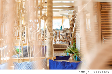 The interior of the urban river ship, with a panoramic view of the urban landscape. The concept of The interior of the urban river ship, with a panoramic view of the urban landscape. The concept of 54453385