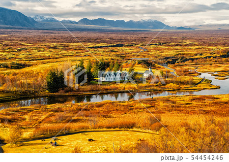 Countryside with river, church, houses on mountain Countryside with river, church, houses on mountain 54454246