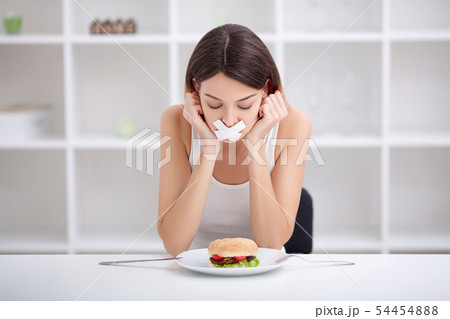 Diet. Unhealthy eating. Junk food concept. Girl don't eat junk food Diet. Unhealthy eating. Junk food concept. Girl don't eat junk food 54454888