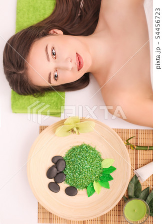 Woman under professional facial massage in beauty spa 54456723