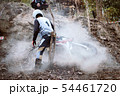 Accident in mountain bikes race in dirt track 54461720
