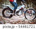 Trials motorcycle while competition in nature 54461721