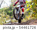 Trials motorcycle while competition in nature 54461726