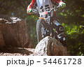 Trials motorcycle in competition 54461728