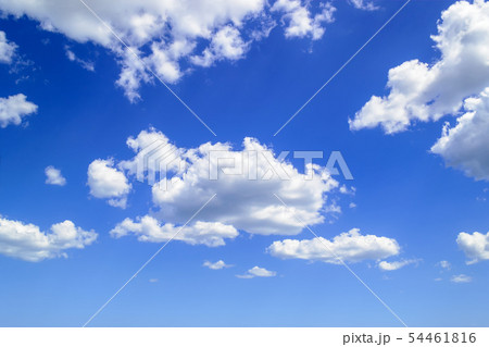 White fluffy cumulus clouds high in the blue sky White fluffy cumulus clouds high in the blue sky 54461816