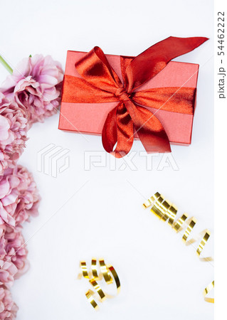 White background with red gift box and peony White background with red gift box and peony 54462222