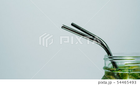 Metal recyclable drinking straws, copy space 54465493