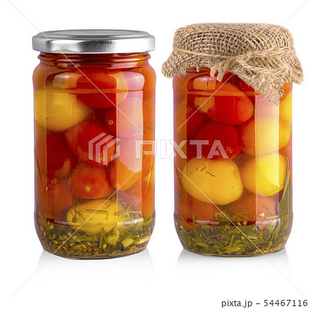 The  pickled red and yellow tomato in glass 54467116
