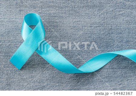 Blue ribbon symbolic of prostate cancer awareness  54482367