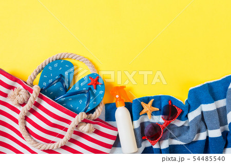 Summer bag background with copy space. Flat lay Summer bag background with copy space. Flat lay 54485540