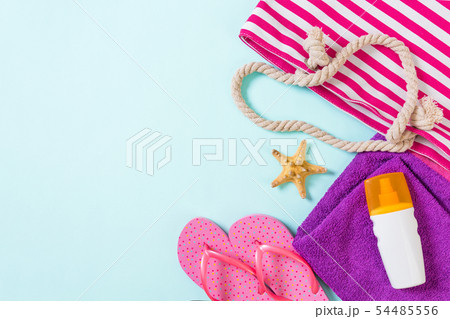 Summer bag background with copy space. Flat lay Summer bag background with copy space. Flat lay 54485556