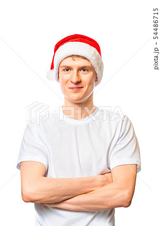 Young man in santa claus hat isolated on white background. 54486715