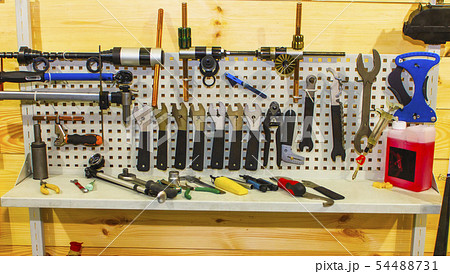 Bicycle tools in the board. Bike mechanic garage Bicycle tools in the board. Bike mechanic garage 54488731