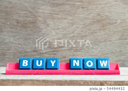 Tile letter on red rack in word buy now Tile letter on red rack in word buy now 54494432
