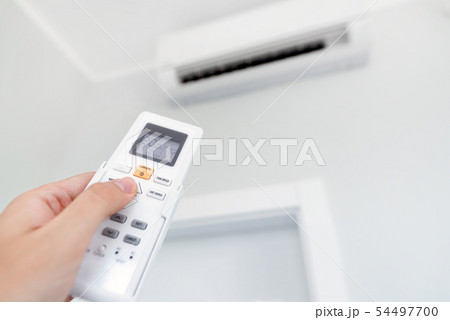 Air conditioning system, hand with remote control Air conditioning system, hand with remote control 54497700
